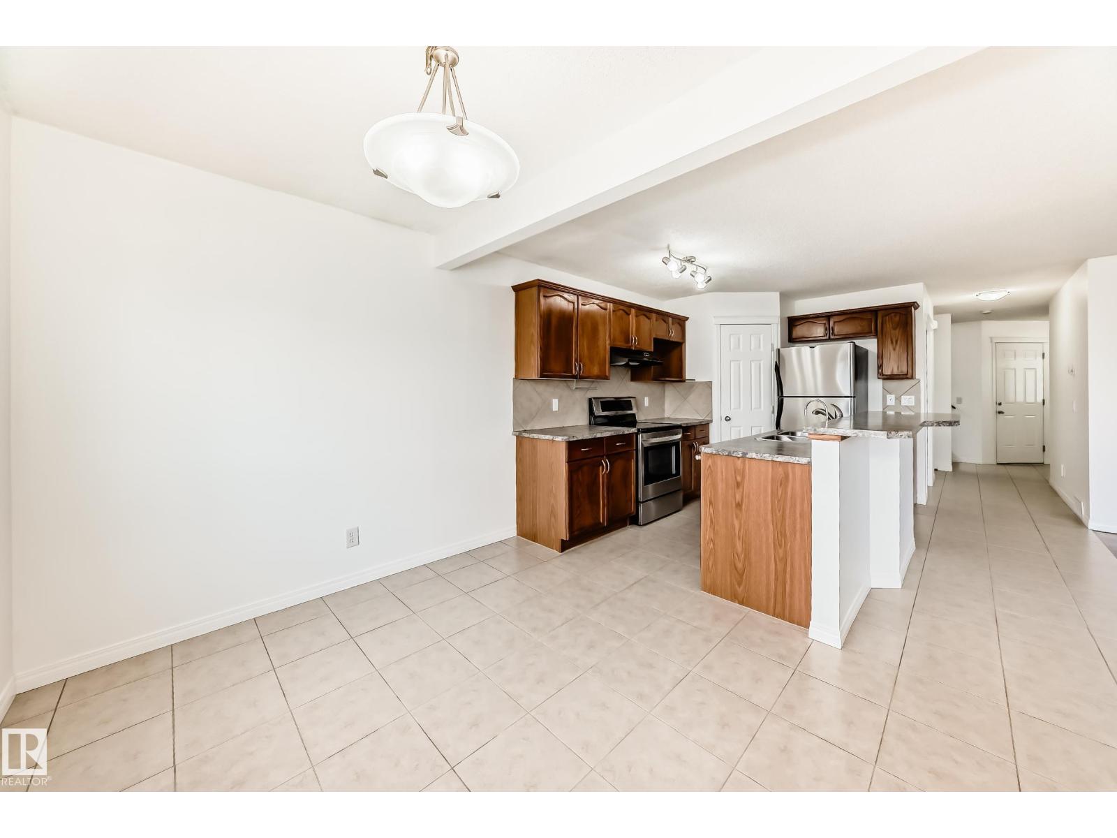 54 Royal Elm Rd, Calgary, Alberta  T3G 5V7 - Photo 3 - E4486754