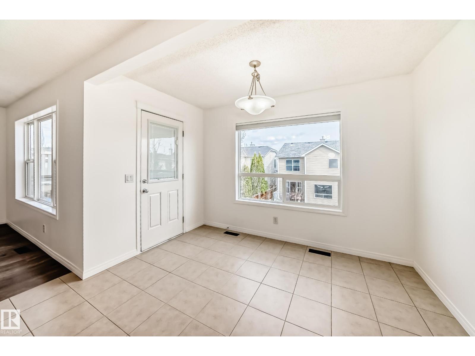 54 Royal Elm Rd, Calgary, Alberta  T3G 5V7 - Photo 5 - E4486754