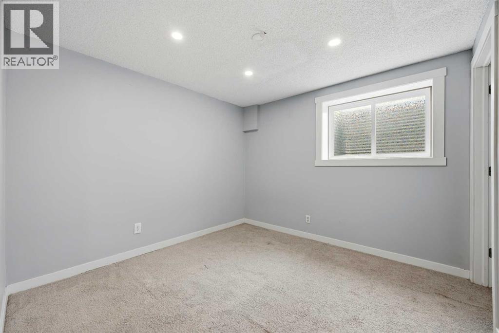 128 Ridgegate Way SW, Airdrie, Alberta  T4B 1A9 - Photo 19 - A2293079