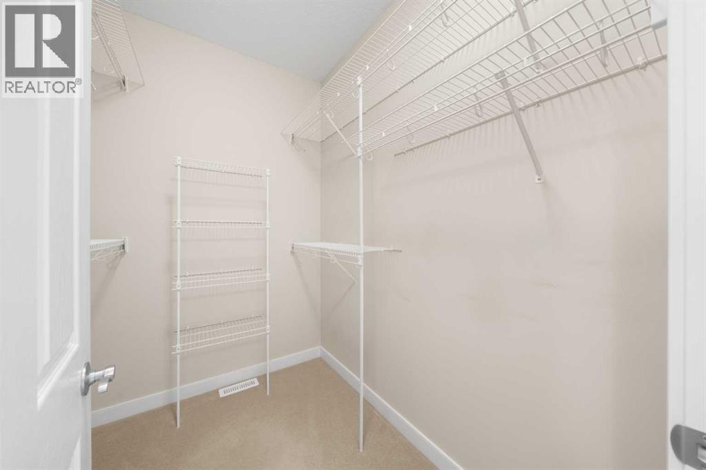 32 Bridle Estates Place SW, Calgary, Alberta  T2Y 0E9 - Photo 20 - A2307784