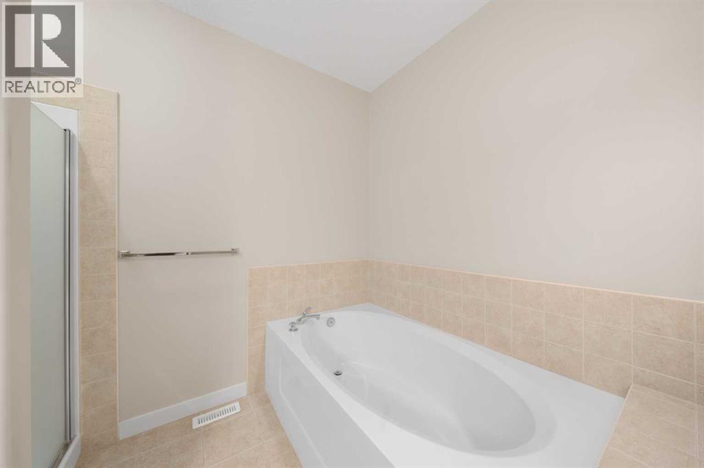 32 Bridle Estates Place SW, Calgary, Alberta  T2Y 0E9 - Photo 19 - A2307784