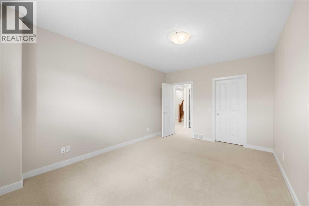 32 Bridle Estates Place SW, Calgary, Alberta  T2Y 0E9 - Photo 26 - A2307784