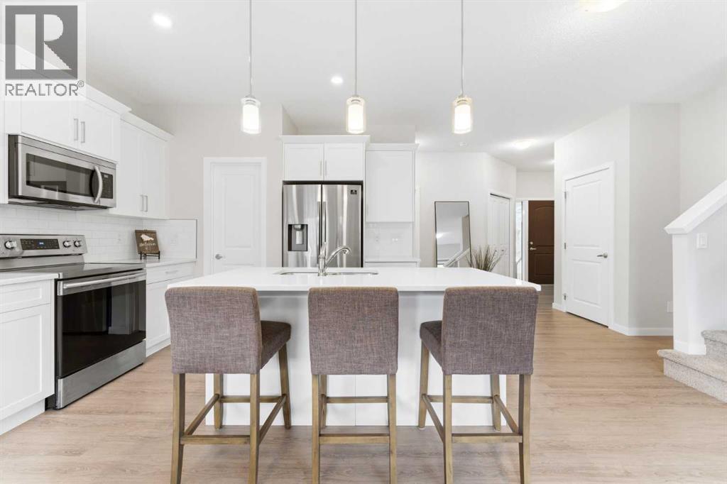 69 Legacy Manor SE, Calgary, Alberta  T2X 2E9 - Photo 7 - A2302444