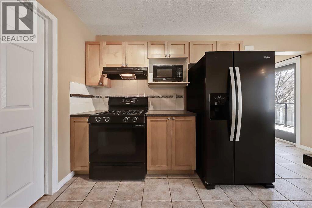 40 Simcoe Place Sw, Calgary, Alberta  T3H 4T8 - Photo 9 - A2305616