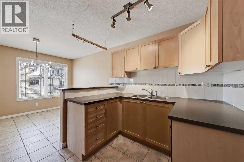40 Simcoe Place Sw, Calgary, Alberta  T3H 4T8 - Photo 7 - A2305616