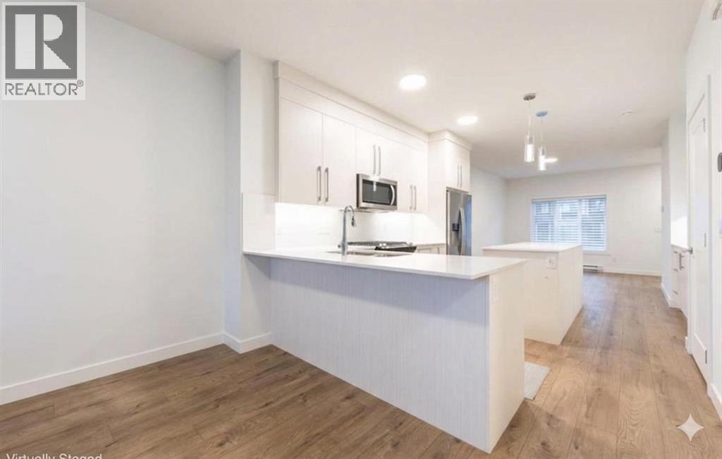 7411 202 Avenue Se, Calgary, Alberta  T3S 0E8 - Photo 3 - A2309075