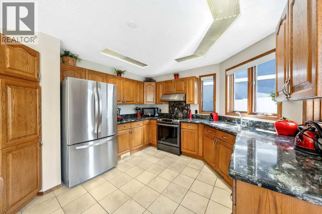5019 Norris Road NW, Calgary, Alberta  T2K 5R6 - Photo 14 - A2308153