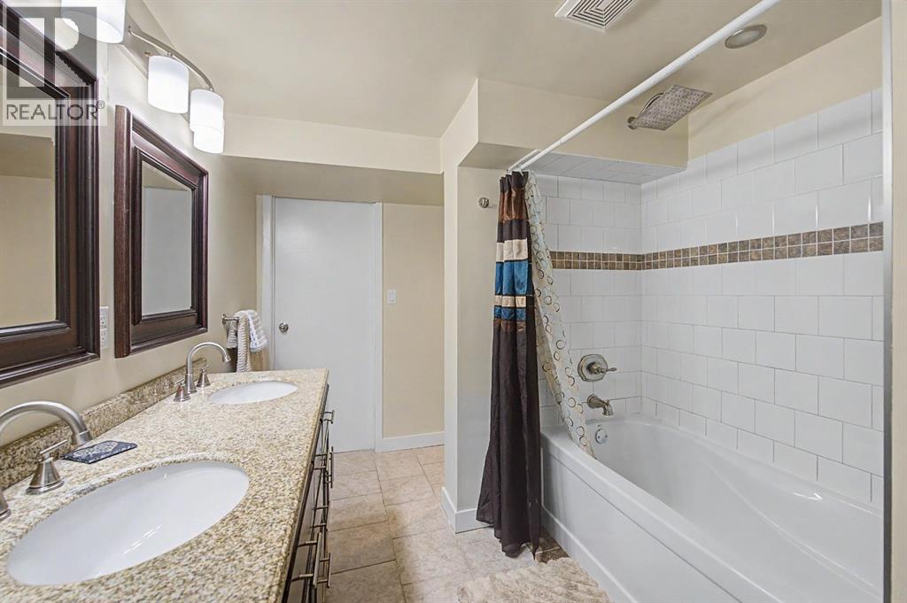 359 Woodvale Crescent SW, Calgary, Alberta  T2W 3L3 - Photo 22 - A2307643