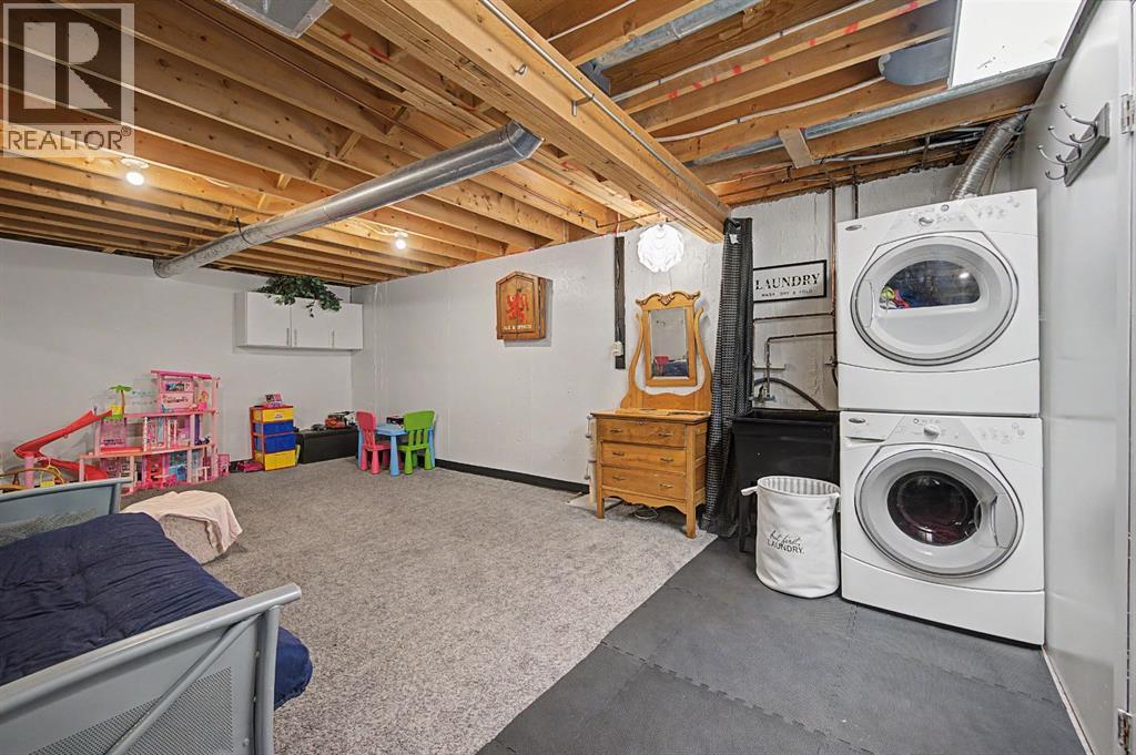 359 Woodvale Crescent SW, Calgary, Alberta  T2W 3L3 - Photo 25 - A2307643