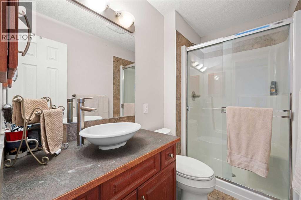7720 Hunterquay Road Nw, Calgary, Alberta  T2K 4T8 - Photo 24 - A2308100