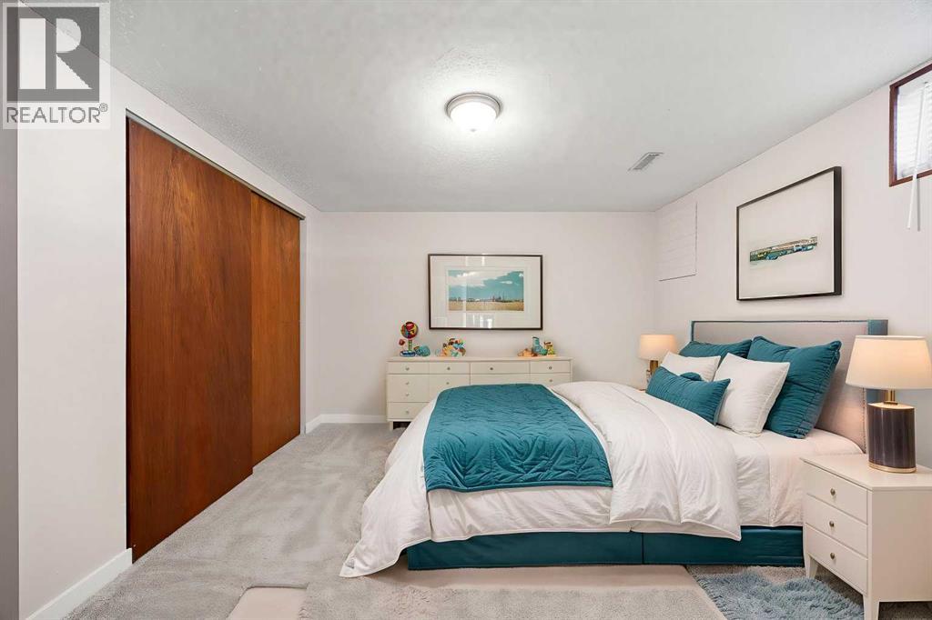 7720 Hunterquay Road Nw, Calgary, Alberta  T2K 4T8 - Photo 31 - A2308100