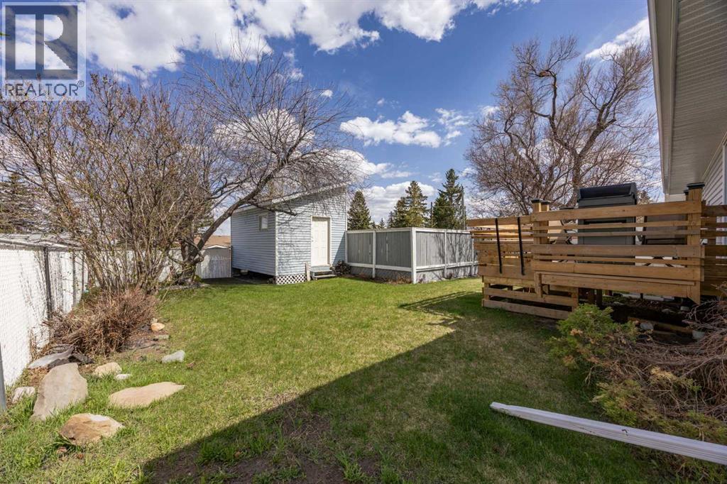 7720 Hunterquay Road Nw, Calgary, Alberta  T2K 4T8 - Photo 42 - A2308100