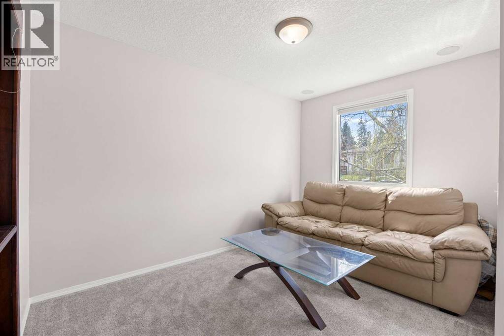 7720 Hunterquay Road Nw, Calgary, Alberta  T2K 4T8 - Photo 7 - A2308100