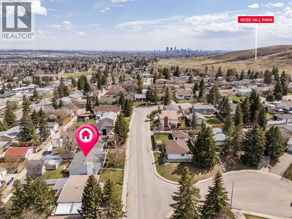7720 Hunterquay Road Nw, Calgary, Alberta  T2K 4T8 - Photo 5 - A2308100