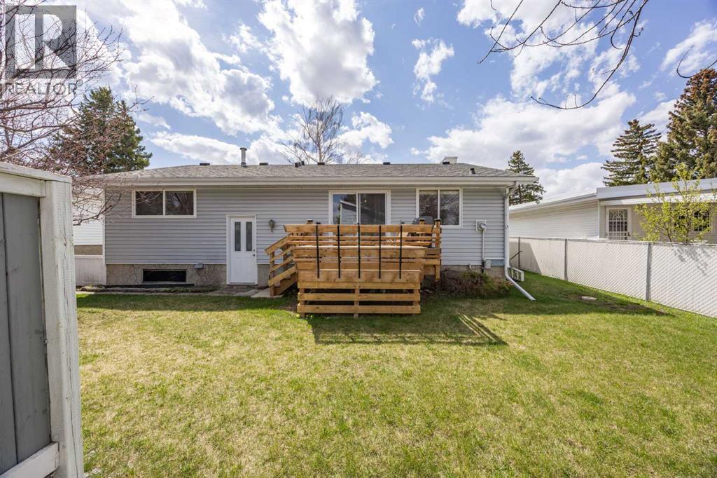 7720 Hunterquay Road Nw, Calgary, Alberta  T2K 4T8 - Photo 43 - A2308100