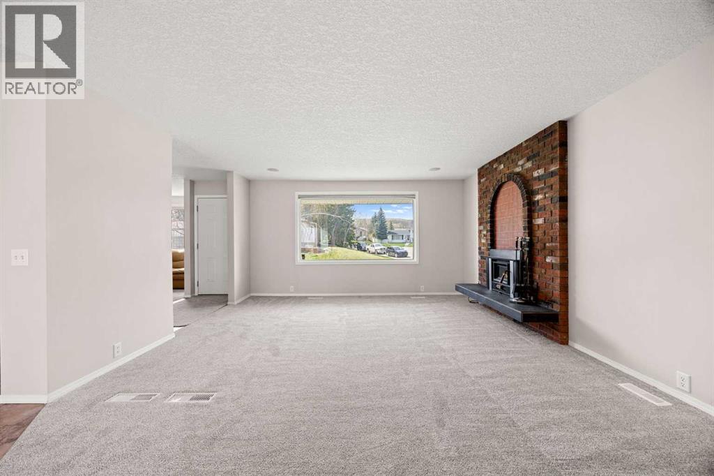 7720 Hunterquay Road Nw, Calgary, Alberta  T2K 4T8 - Photo 14 - A2308100