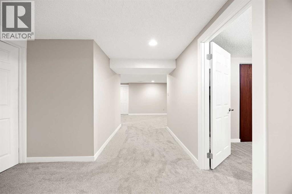 7720 Hunterquay Road Nw, Calgary, Alberta  T2K 4T8 - Photo 29 - A2308100