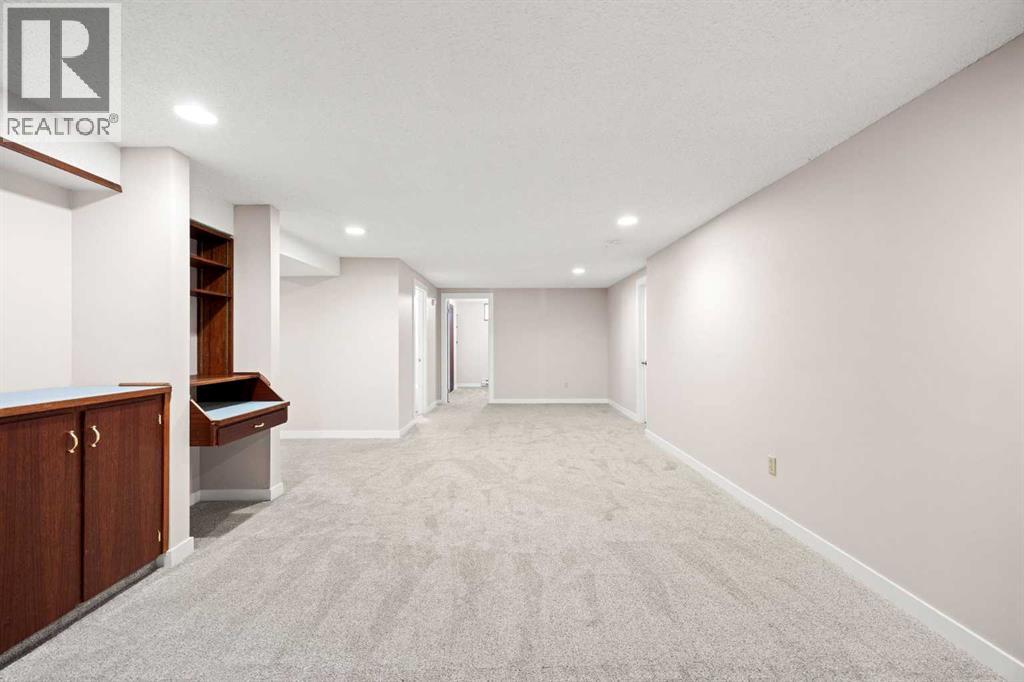 7720 Hunterquay Road Nw, Calgary, Alberta  T2K 4T8 - Photo 33 - A2308100