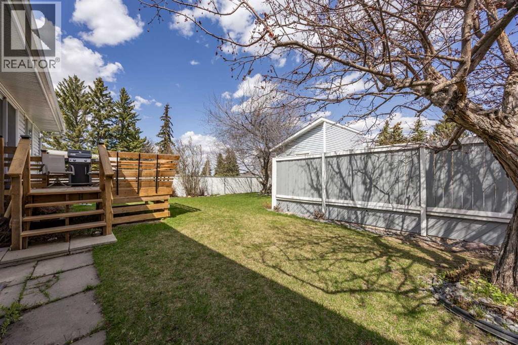 7720 Hunterquay Road Nw, Calgary, Alberta  T2K 4T8 - Photo 40 - A2308100