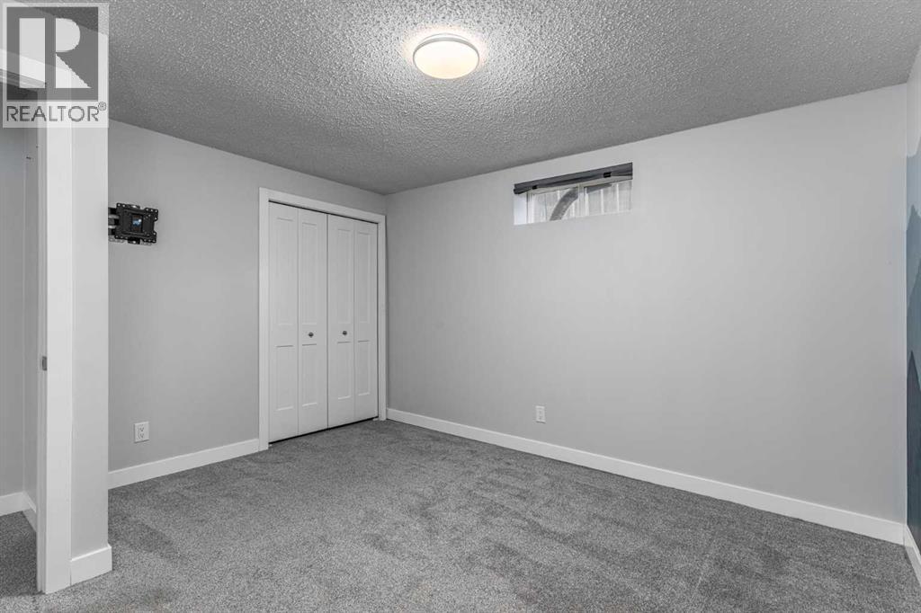 36 Bearberry Crescent NW, Calgary, Alberta  T3K 1R2 - Photo 26 - A2308419
