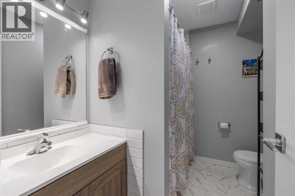 76 Woodborough Crescent SW, Calgary, Alberta  T2W 5A2 - Photo 17 - A2308926