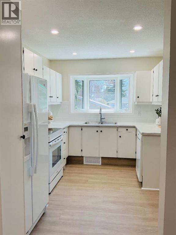 487 Arlington Drive Se, Calgary, Alberta  T2H 1S4 - Photo 12 - A2302796