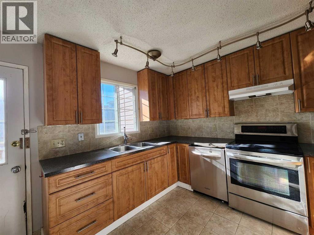 48 Bermondsey Court NW, Calgary, Alberta  T3K 1V7 - Photo 9 - A2287982