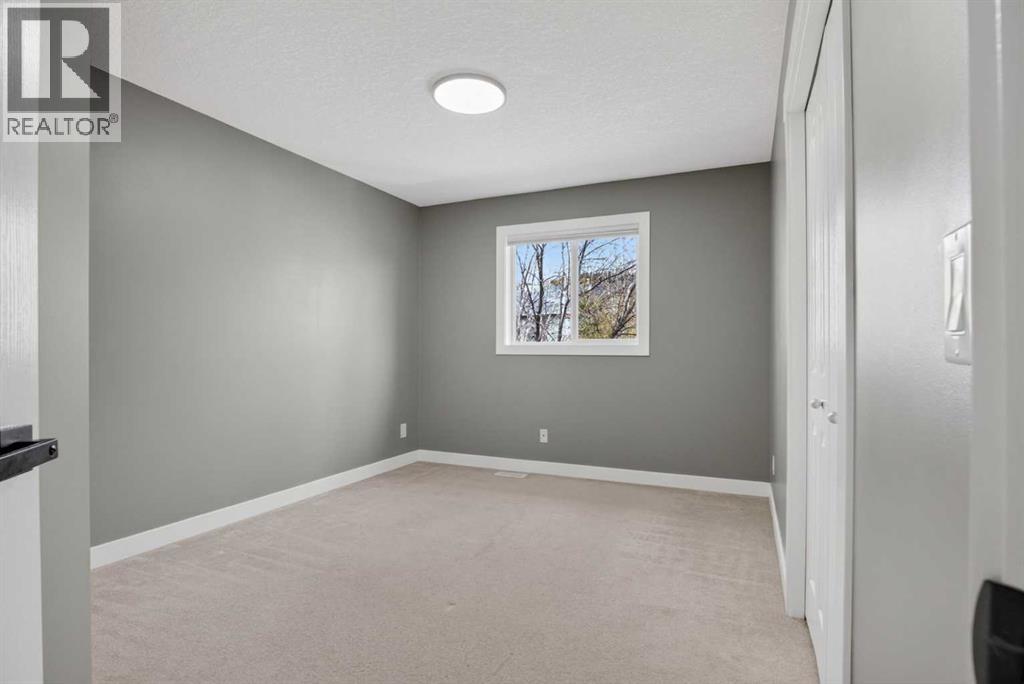 220 Sunterra Ridge Place, Cochrane, Alberta  T4C 1W1 - Photo 35 - A2306417