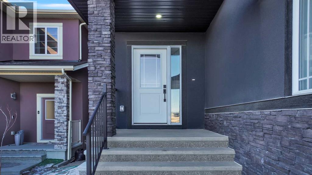 66 Baysprings Gardens SW, Airdrie, Alberta  T4B 5C6 - Photo 3 - A2307758
