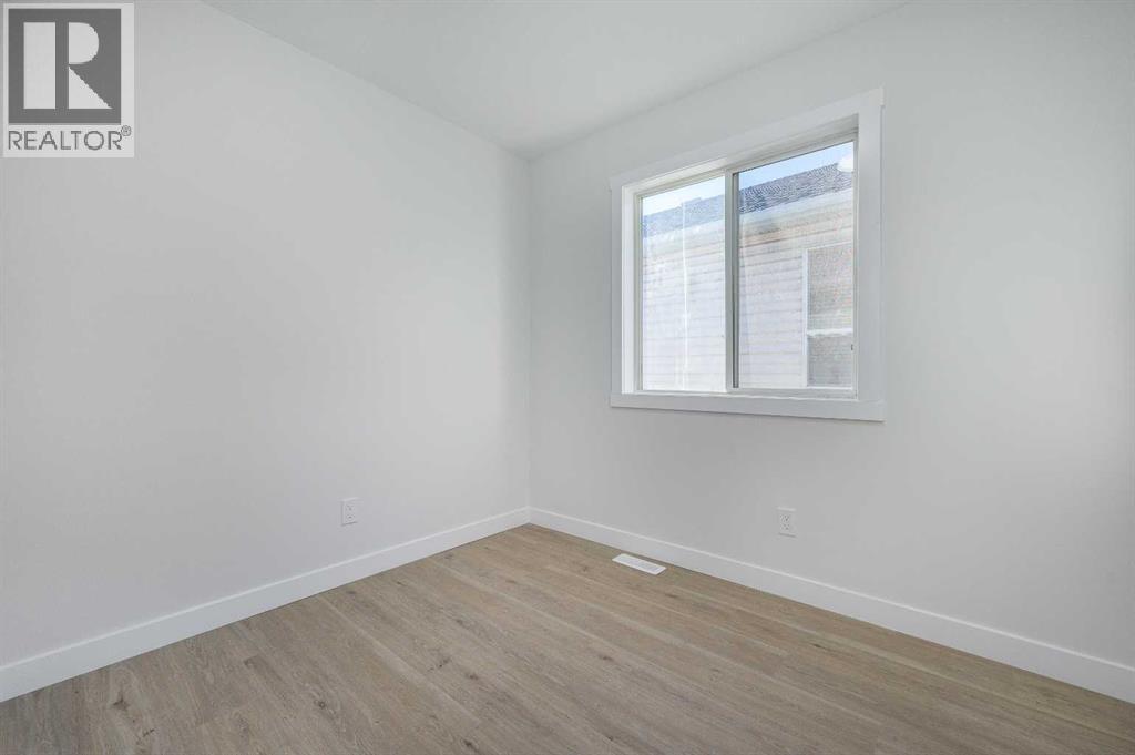 4249 Catalina Boulevard Ne, Calgary, Alberta  T1Y 6Y5 - Photo 8 - A2307028