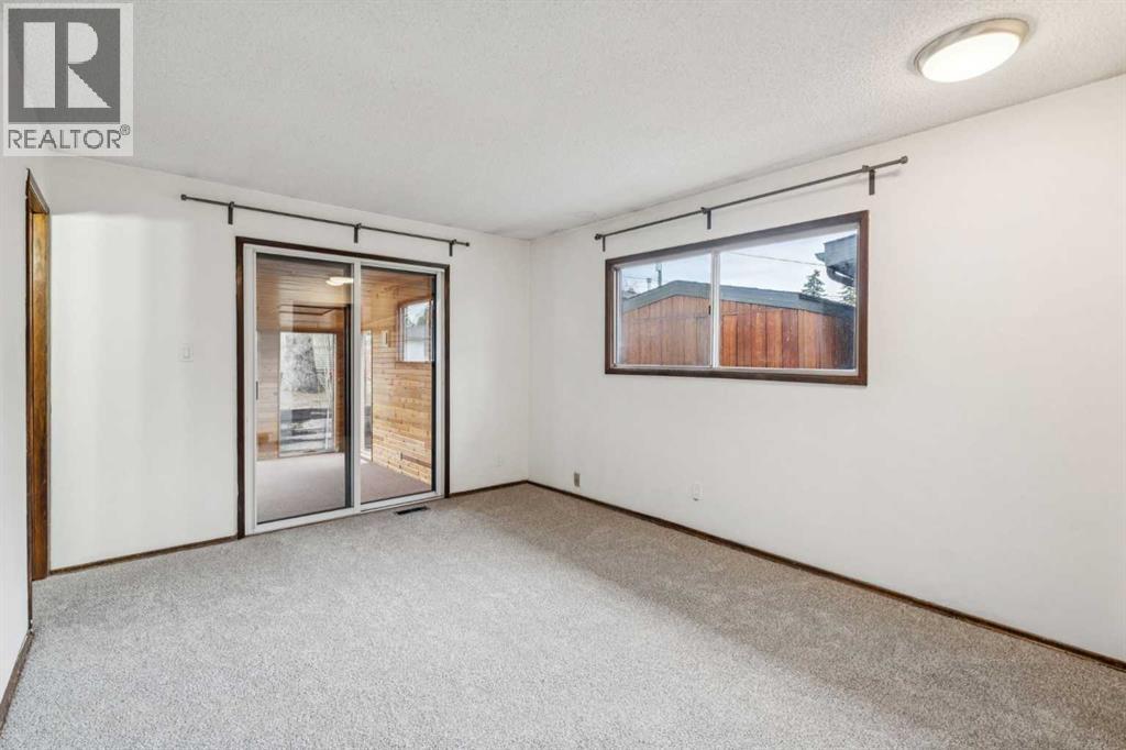 1260 Lake Sylvan Drive SE, Calgary, Alberta  T2J 3C8 - Photo 11 - A2308055