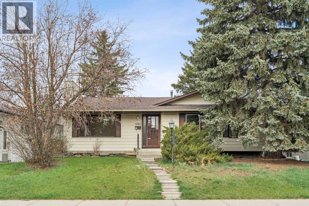 1260 Lake Sylvan Drive SE, Calgary, Alberta  T2J 3C8 - Photo 1 - A2308055