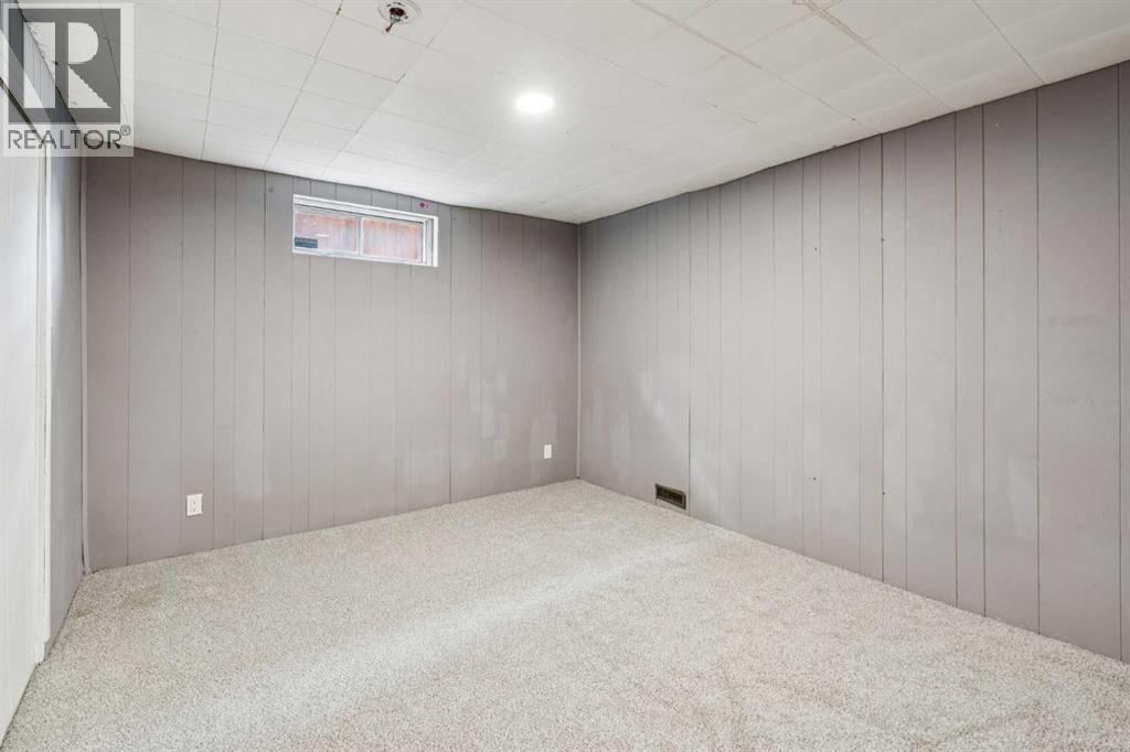 1260 Lake Sylvan Drive Se, Calgary, Alberta  T2J 3C8 - Photo 21 - A2308055