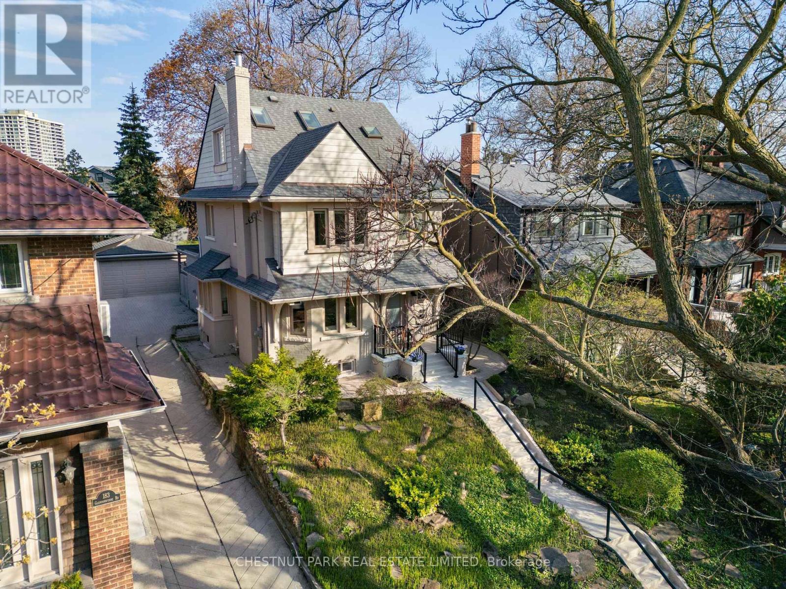 A home worthy of a Hallmark movie! This home was featured in "The Way Home," starring Andie MacDowell. A rare offering on a coveted, tree-lined street in sought-after High Park North, this grand yet welcoming family home offers exceptional space and is well-maintained. The home is 2-storey and features 4+2 bedrooms and 4 bathrooms, including a coveted main floor family room and main floor powder room, rare in the neighbourhood. The additional storey allows for a private third-floor primary retreat. A generous and well-appointed 1-bedroom apartment on the lower level offers flexibility for extended family or income potential, plus a separate lower-level room offering flexibility as an additional bedroom or hobby space. The open-concept main floor features a custom kitchen with quartz countertops, peninsula seating, stainless steel appliances, and a greenhouse window. The sun-filled living room with wood-burning fireplace flows into a dining area ideal for entertaining. The family room with a gas fireplace offers a walkout to the garden, while a mudroom with built-in storage and heated floors adds convenience. The second floor includes three well-proportioned bedrooms and a renovated spa-inspired bathroom with a soaker tub, glass shower, and double vanity. The third floor is a private primary retreat with a 3-piece ensuite and a large closet. Additional highlights include hardwood floors, crown moulding, excellent ceiling height, including the basement, 200-amp service, and updated Bell fibre optics. The 43 x 120 ft lot offers a mutual drive with access to a 2-car garage plus one parking space. Landscaped gardens with mature trees provide a private, low-maintenance outdoor setting. Ideally located near Runnymede PS, Humberside CI, Ravina Gardens, High Park, Grenadier Pond, Bloor West shops, and transit, including the UP Express and Bloor subway (id:48254)