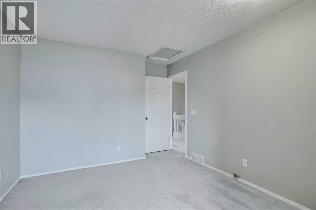 219 Coachway Lane Sw, Calgary, Alberta  T3H 1A4 - Photo 33 - A2293775