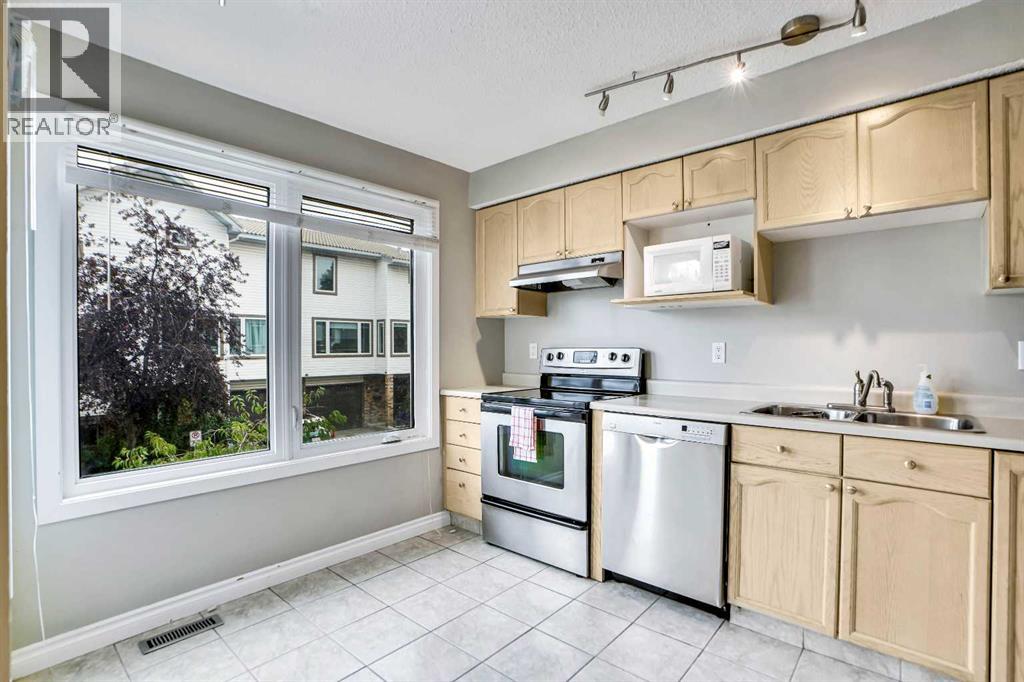 219 Coachway Lane Sw, Calgary, Alberta  T3H 1A4 - Photo 14 - A2293775