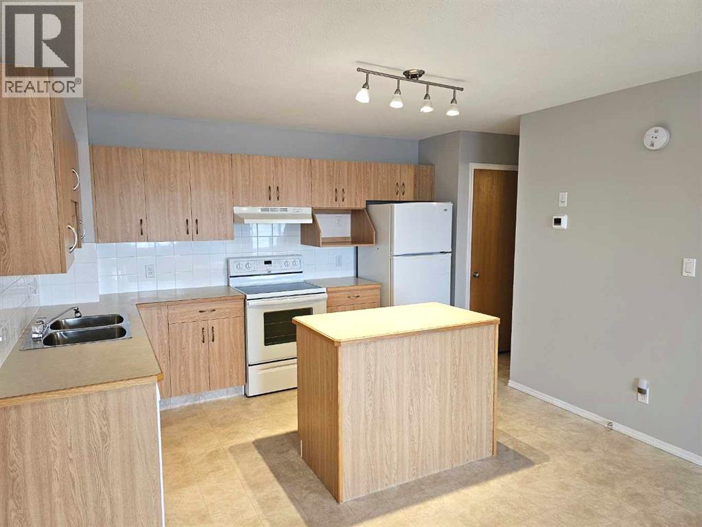 4, 11 Highlands Place W, Lethbridge, Alberta  T1J 4X8 - Photo 13 - A2309689