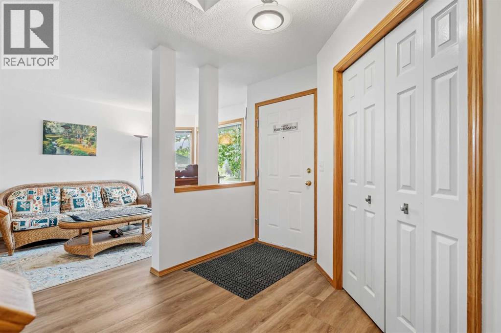 39 Arbour Wood Close NW, Calgary, Alberta  T3G 4A8 - Photo 4 - A2291285