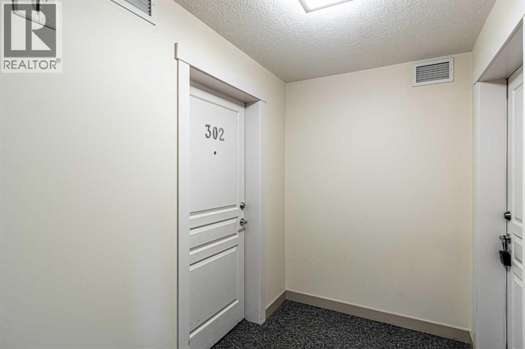 302, 2300 Evanston Square NW, Calgary, Alberta  T3P 0G8 - Photo 4 - A2291603