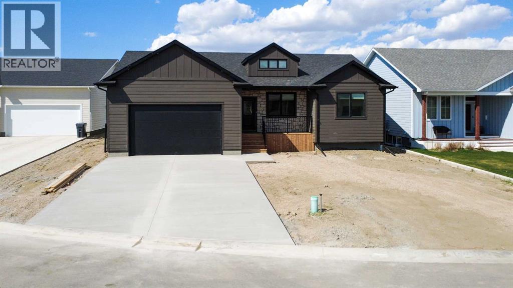 306 Bridge Crossing Close, Raymond, Alberta  T0K 2S0 - Photo 1 - A2308874