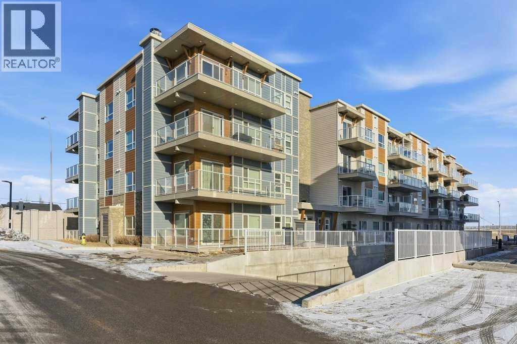 305, 200 Harvest Hills Place NE, Calgary, Alberta  T2M 0C8 - Photo 2 - A2283997