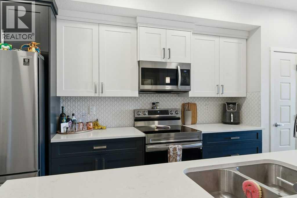 305, 200 Harvest Hills Place NE, Calgary, Alberta  T2M 0C8 - Photo 9 - A2283997