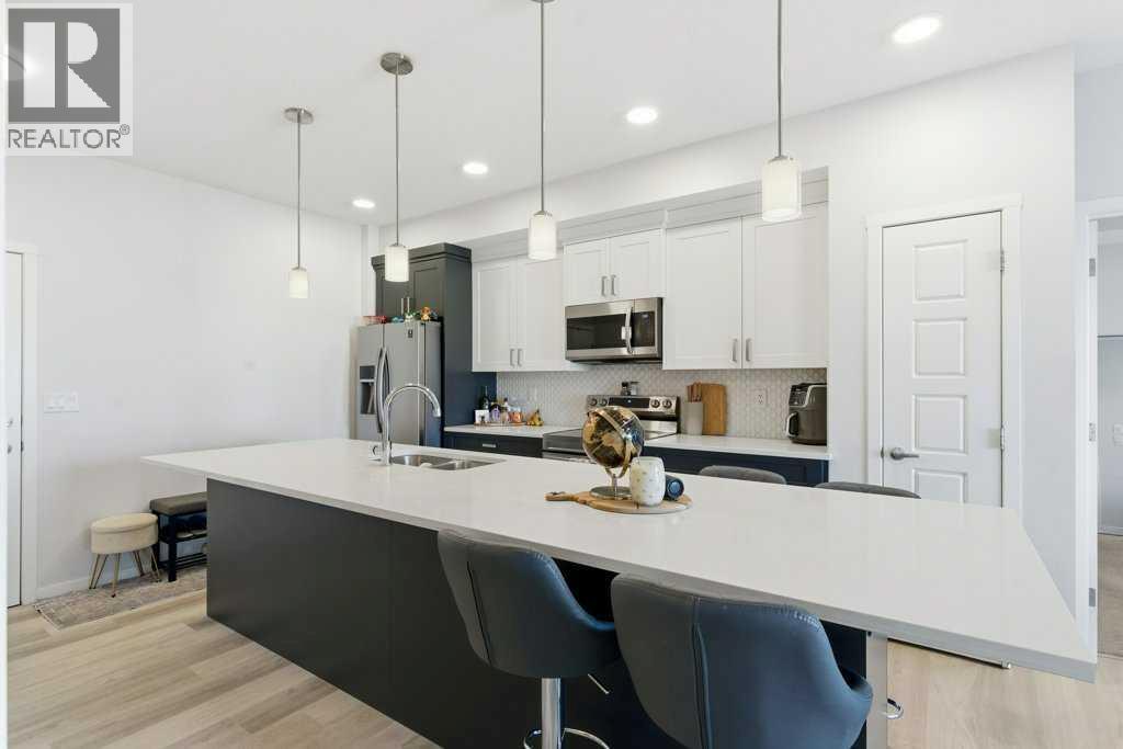 305, 200 Harvest Hills Place NE, Calgary, Alberta  T2M 0C8 - Photo 10 - A2283997