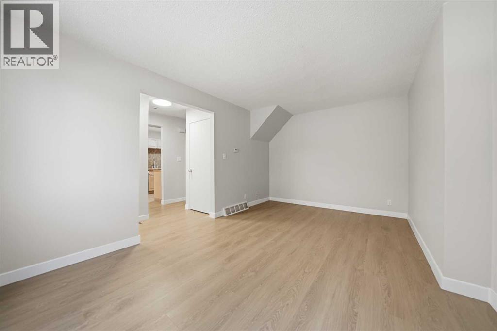 8, 4936 Dalton Drive NW, Calgary, Alberta  T3A 2E4 - Photo 5 - A2305538