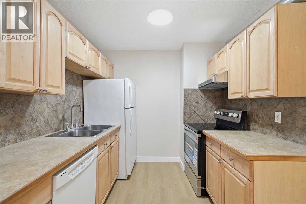 8, 4936 Dalton Drive NW, Calgary, Alberta  T3A 2E4 - Photo 7 - A2305538