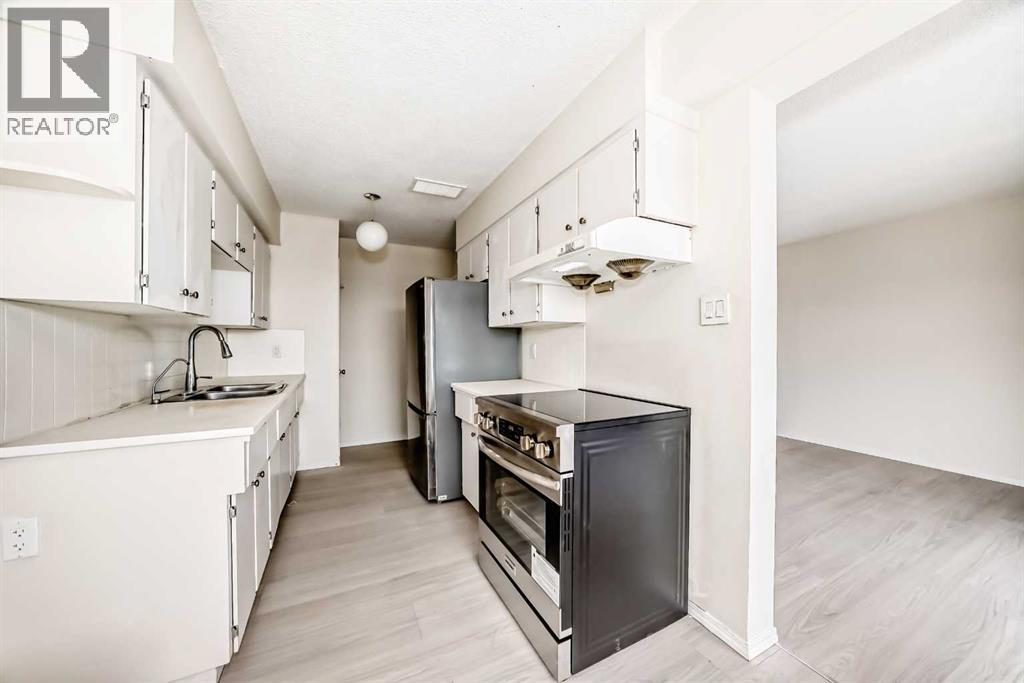 2, 6147 Buckthorn Road Nw, Calgary, Alberta  T2K 2Z2 - Photo 4 - A2309737