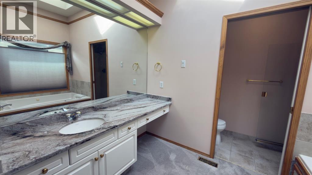 117 Woodpark Close SW, Calgary, Alberta  T2W 6H1 - Photo 21 - A2309782