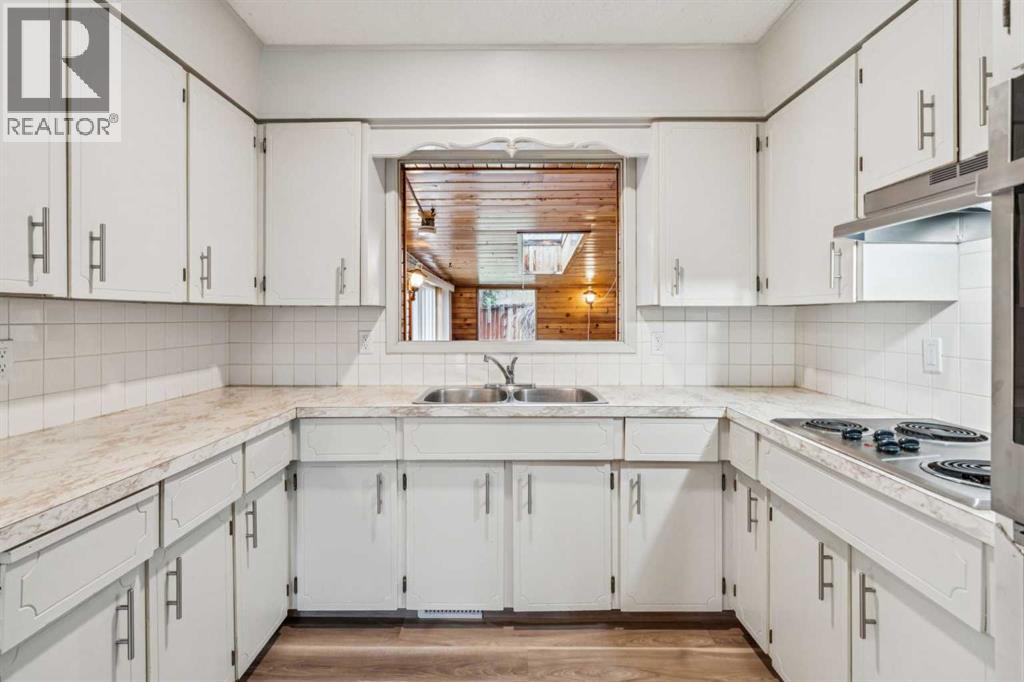 1260 Lake Sylvan Drive Se, Calgary, Alberta  T2J 3C8 - Photo 7 - A2308055