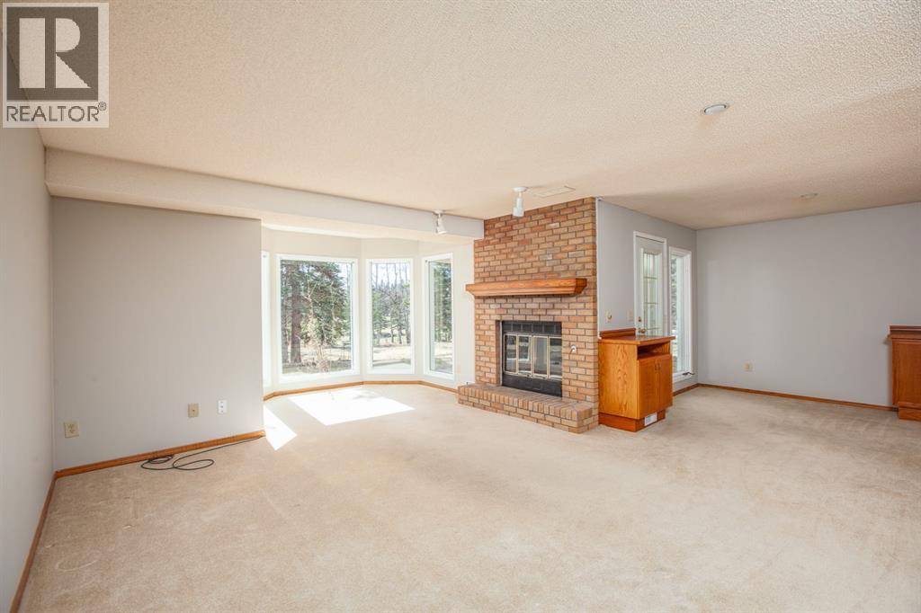 24 Sunrise Way, Priddis Greens, Alberta  T0L 1W3 - Photo 16 - A2303634