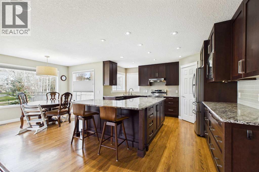149 Tuscany Ravine Bay Nw, Calgary, Alberta  T3L 2S9 - Photo 4 - A2309418